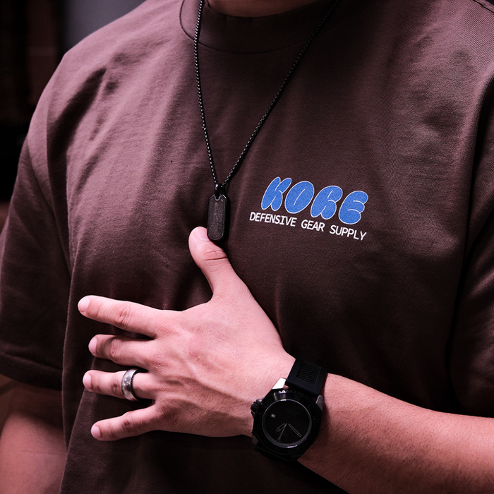 Person Wearing Walnut Kore Essentials Bubble T-Shirt