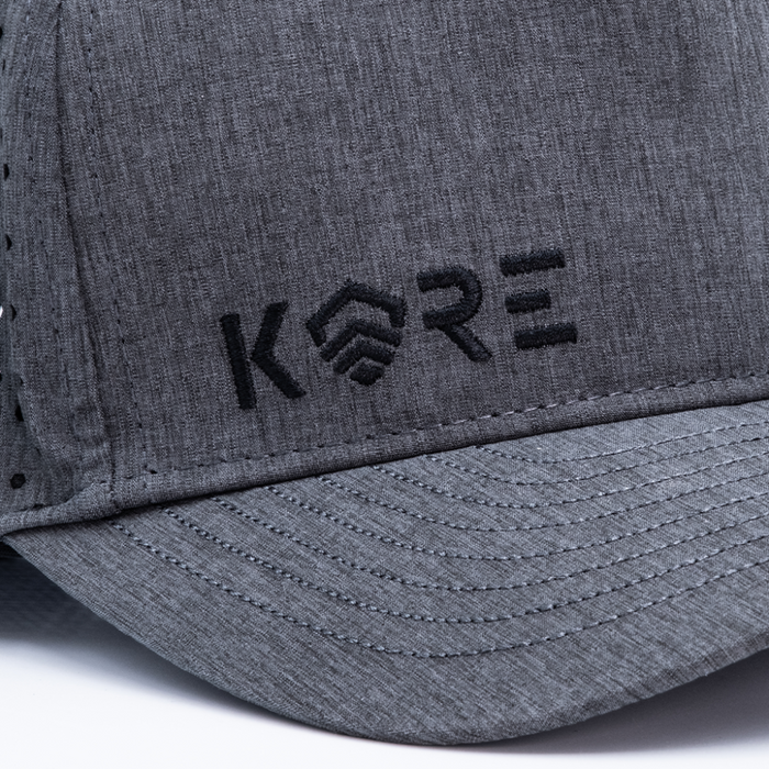 Close-up of Kore Essentials Grey Coast Hat with Black Kore Logo