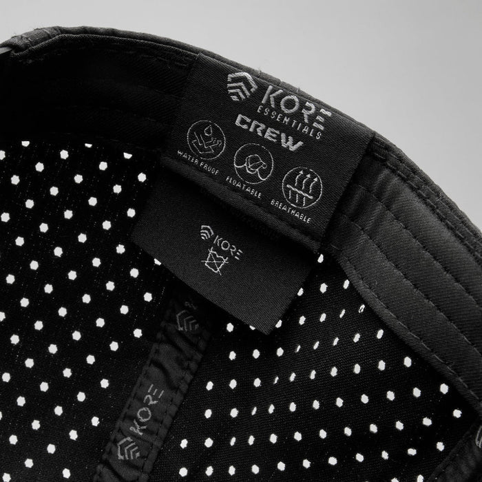 Inside of Kore Essentials Black Crew Hat Showcasing the Waterproof, Floatable and Breathable Features