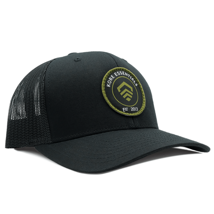 Frontside View of Black Kore Essentials Trucker Cap with Kore Logo Embroidered on Front
