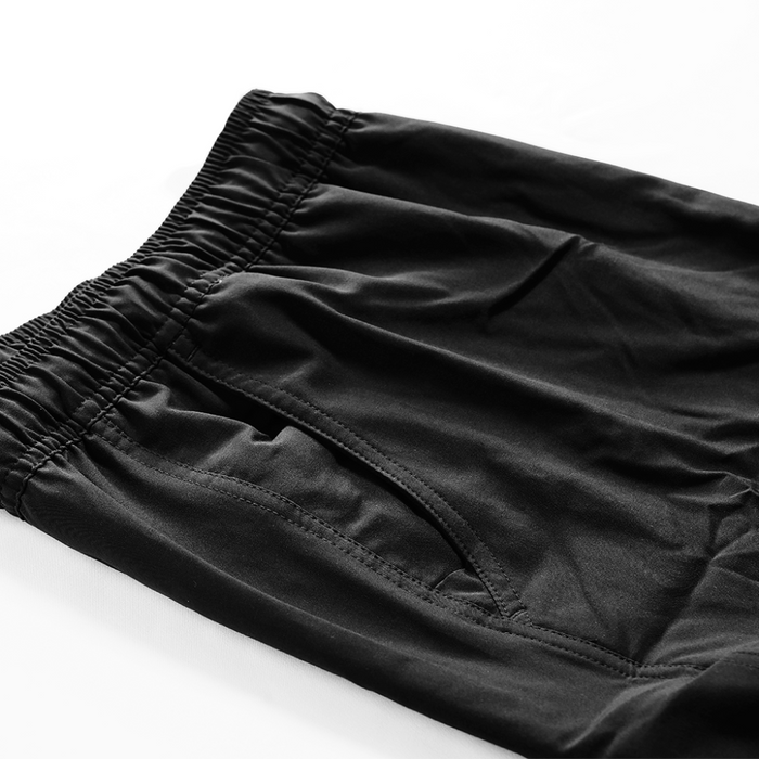 Black Kore Essentials Sport Shorts Side View Showcasing Pockets