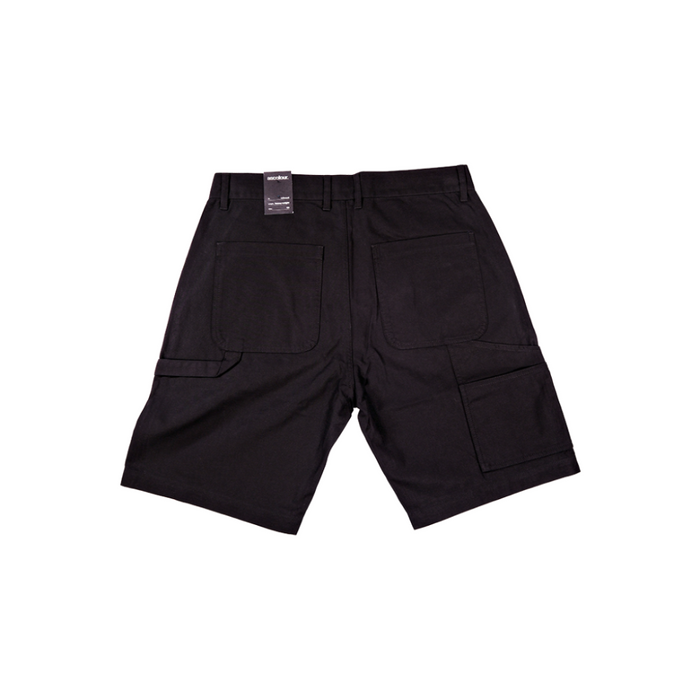 Back side of a pair of black Kore Essentials utility shorts on a white background