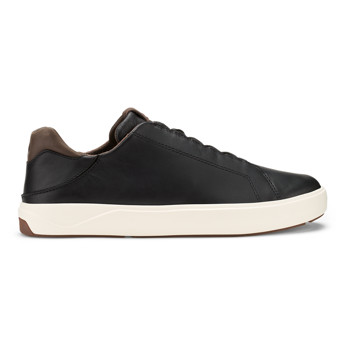 Black leather lace-up sneaker with cream rubber sole and dark brown heel tab, shown in side profile.