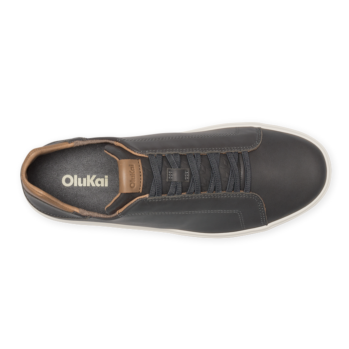Top view of charcoal and tan lace-up sneaker with white sole and brown heel collar trim.