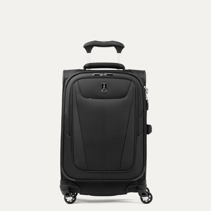 front view of black travelpro maxlite 5 compact carry-on spinner showing the front zippered pocket and telescoping handle.