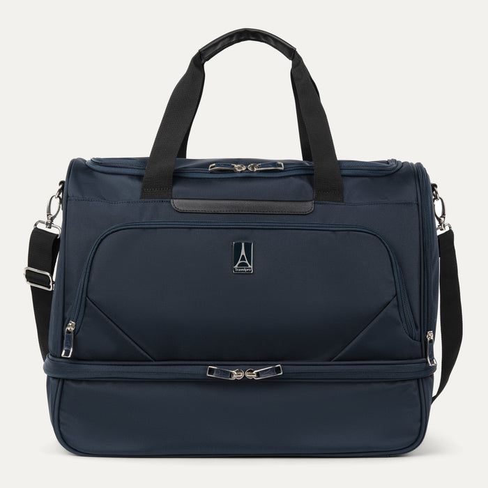 front view of midnight blue travelpro maxlite 5 drop bottom weekender showing the separate bottom compartment and front zippered pocket.