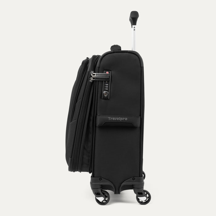 side profile view of the black travelpro maxlite 5 international carry-on spinner showing its slim design, four 360-degree rotating spinner wheels, and the extended powerscope lite handle.