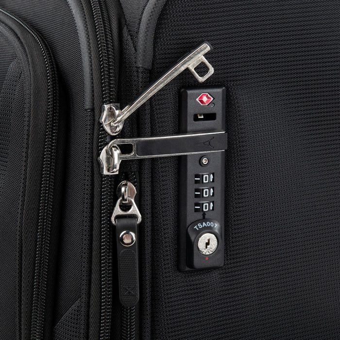 close-up view of the black travelpro maxlite 5 international carry-on spinner showing the integrated tsa-approved combination lock with zippered pulls secured in the locking slots.