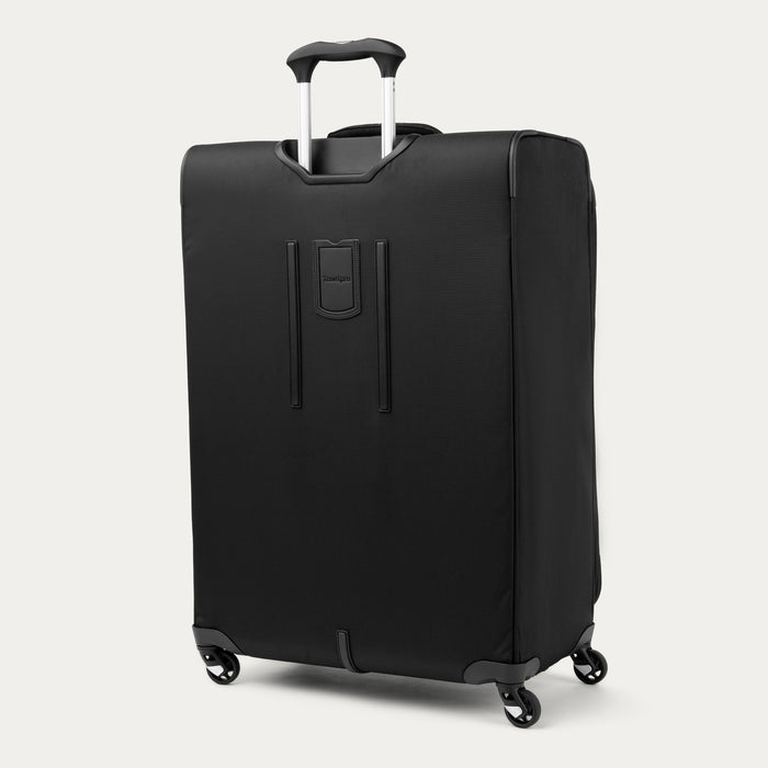 rear view of the black travelpro maxlite 5 large check-in spinner showing the adjustable powerscope lite handle and the integrated rear identification pocket.