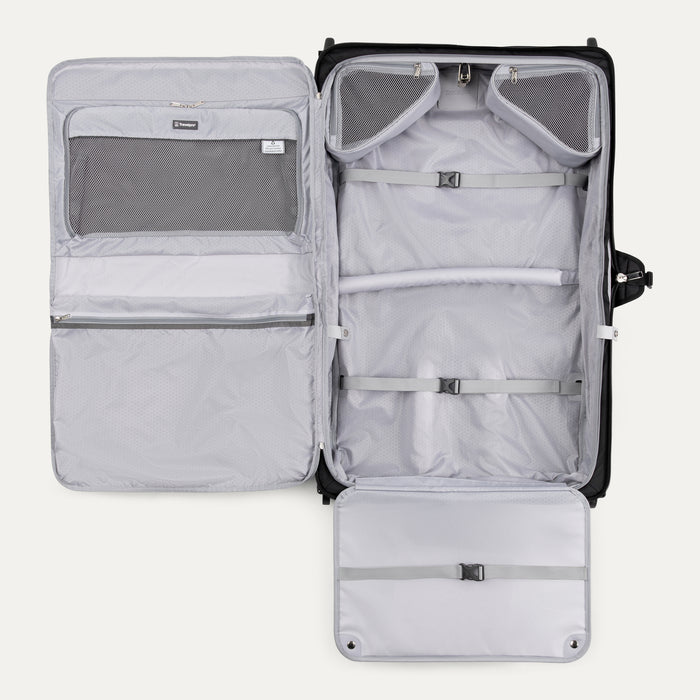 interior view of the open black travelpro maxlite 5 rolling carry-on garment bag showing the lay-flat design with padded straps, multiple mesh pockets, and built-in organization for suits and dresses.