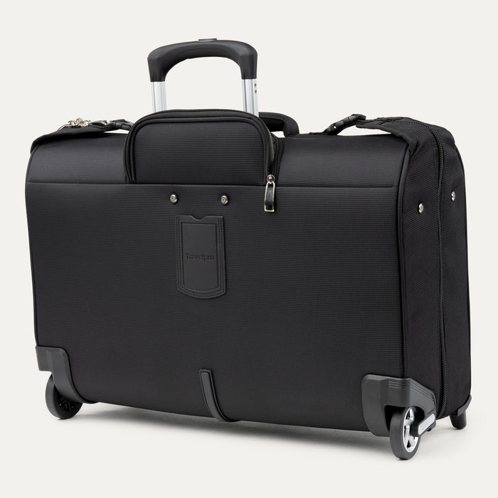 rear view of the black travelpro maxlite 5 rolling carry on garment bag showing the powerscope lite extension handle and integrated rear identification pocket.