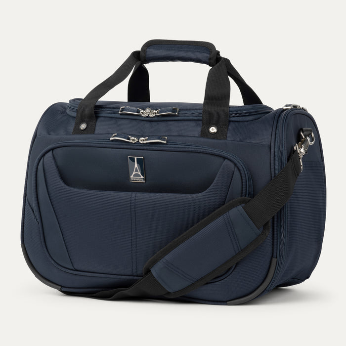 front view of the midnight blue travelpro maxlite 5 soft tote showing the padded shoulder strap, top carry handles, and the front zippered pocket with travelpro logo.