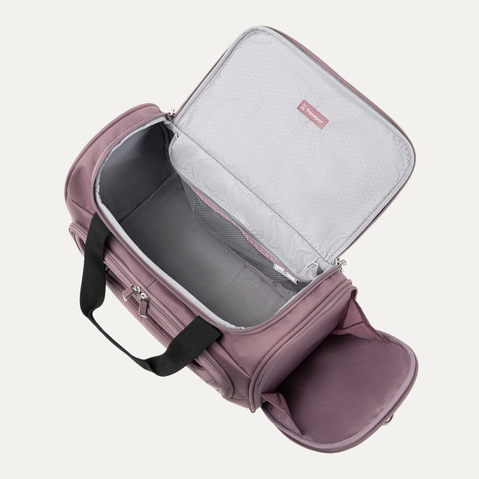 interior view of the open dusty rose pink travelpro maxlite 5 soft tote showing the spacious main compartment with gray ecofab lining and a large mesh zippered pocket under the lid.