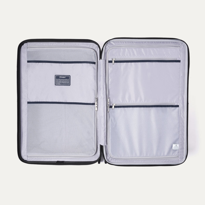 Interior view of Travelpro Maxlite Air V2 Spinner featuring mesh zippered compartments for organized packing.