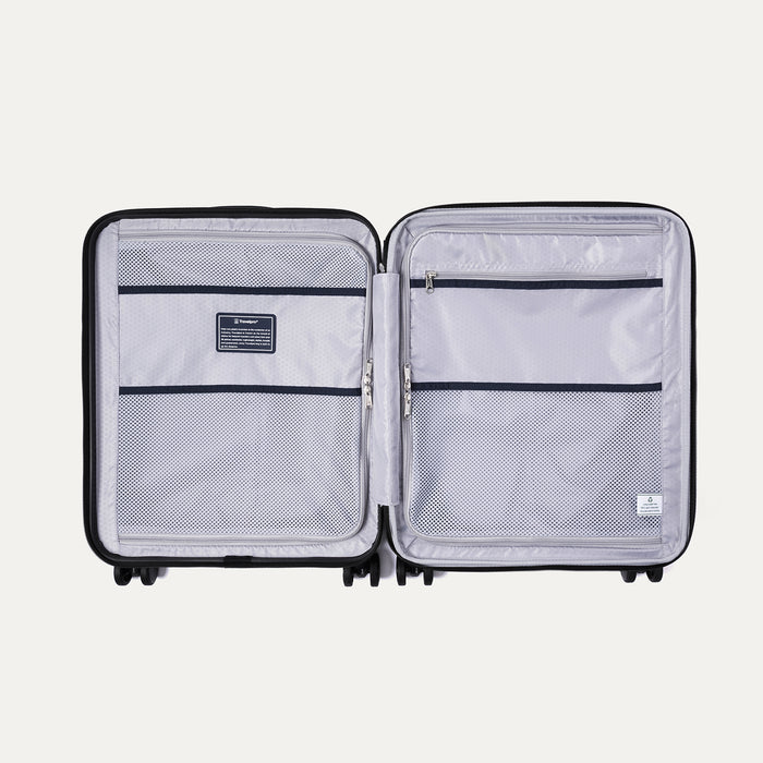 Interior view of Maxlite Air V2 featuring dual mesh zippered compartments for organized packing.