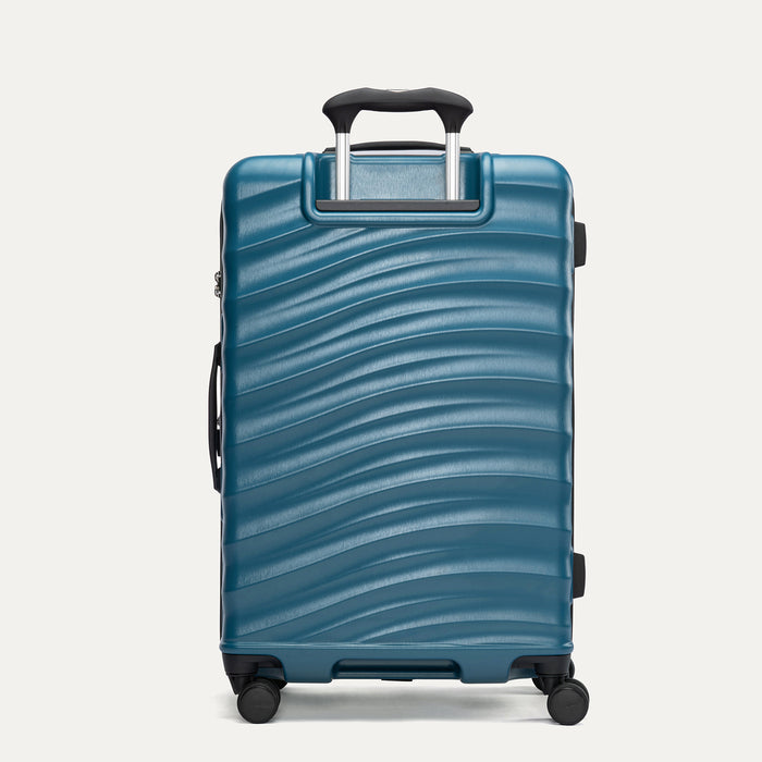 Rear view of Travelpro Maxlite Air V2 Check-In Spinner in Teal, showing the extended telescopic handle and side carry handle