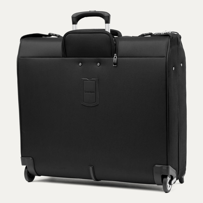 rear side view of black travelpro maxlite checked rolling garment bag showing two high performance wheels and telescoping handle.