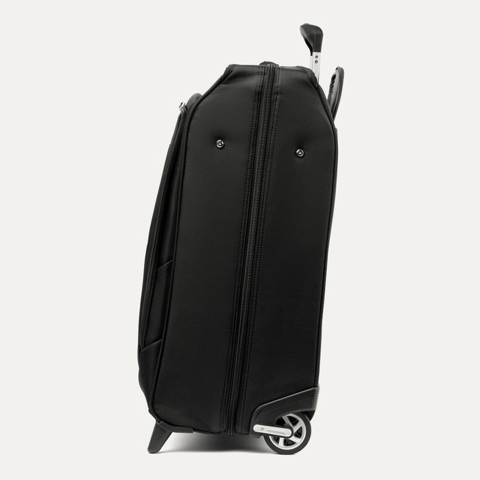 side profile view of black travelpro maxlite checked rolling garment bag showing the slim depth and high performance ball bearing wheels.