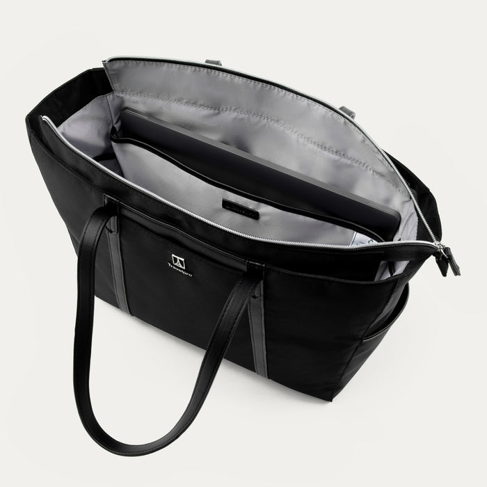 top down interior view of black travelpro maxlite women's tote showing the padded laptop sleeve and spacious main compartment with gray lining.