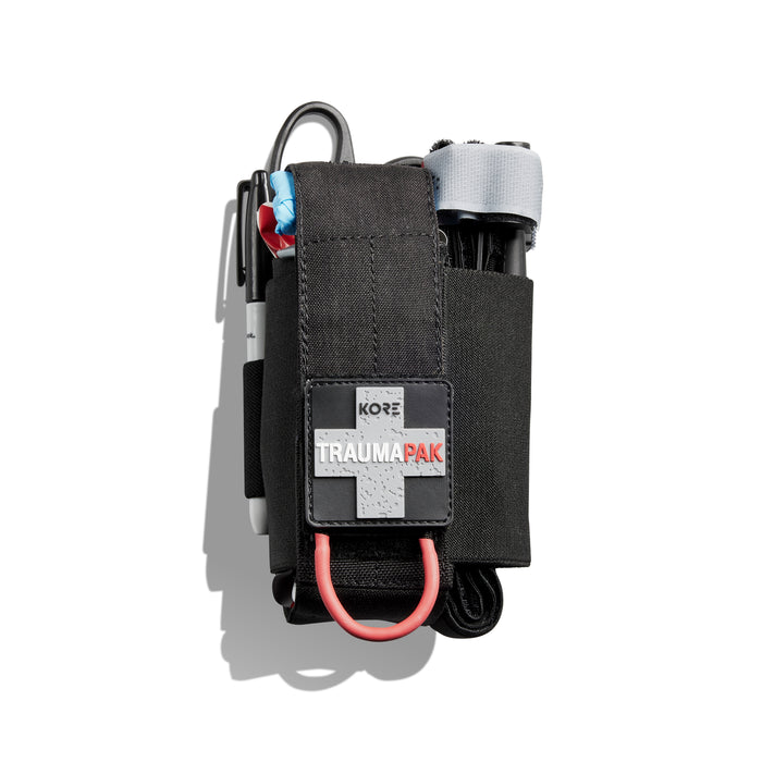 Black Kore Medical Trauma Pak with various components on a white background
