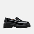 Ms. Adler Black Patent Leather Lug Penny Loafers