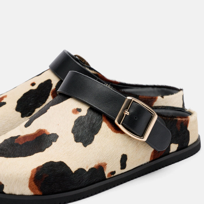 Ms. Solana Cow Print Backstrap Clogs
