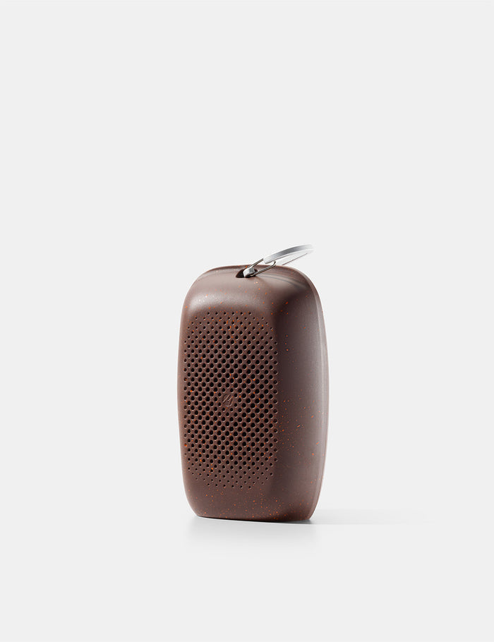 silicone case with orange speckles on white background