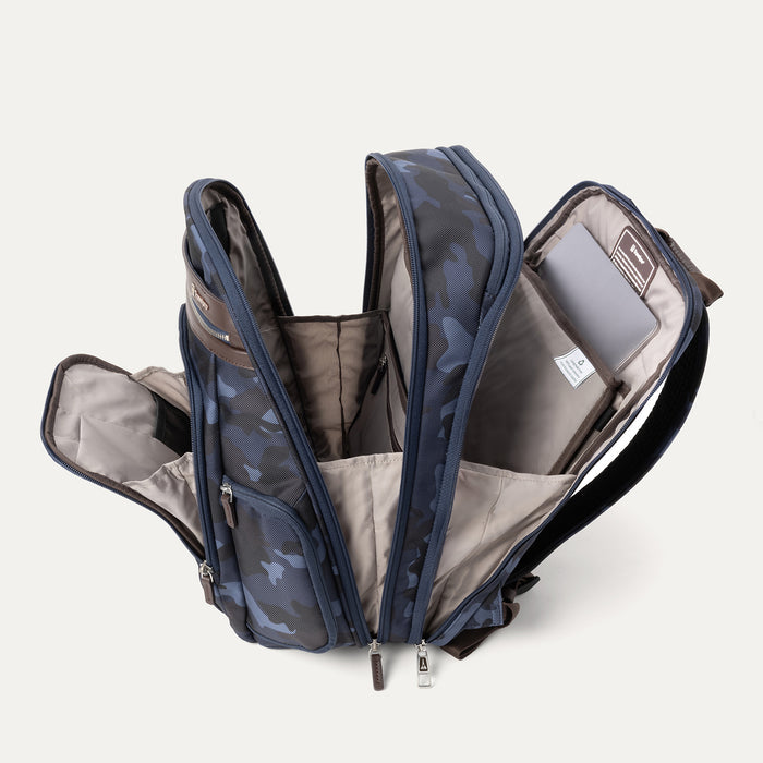 Interior view of Travelpro Platinum Elite Business Backpack in Camouflage, showing padded tech compartments and spacious organization.