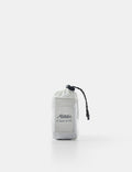White drawstring bag with black branding on a white background