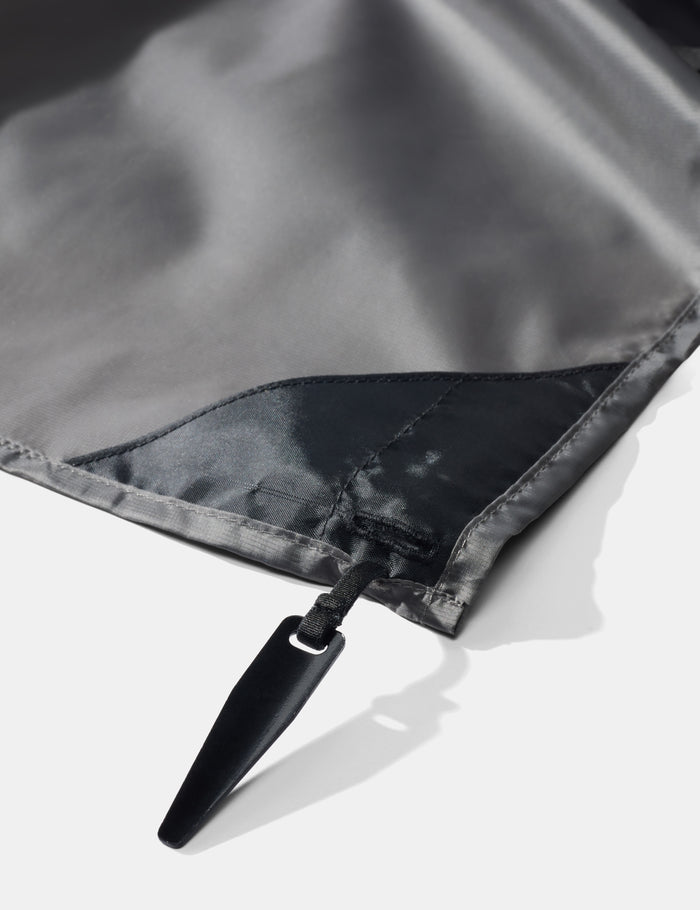 Close-up of pocket blanket corner stake on a white background