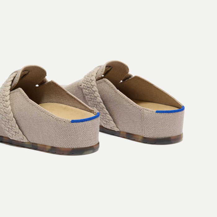 Close up of the heel of The Braid Clog in Dove, with Rothy's signature blue halo.
