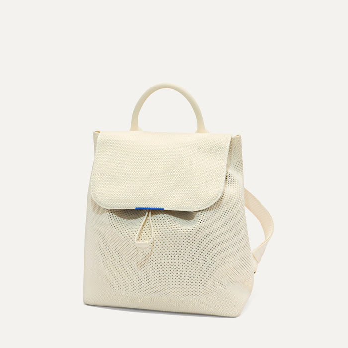 PLP | The Cinch Backpack in Coconut Crochet shown from the front.