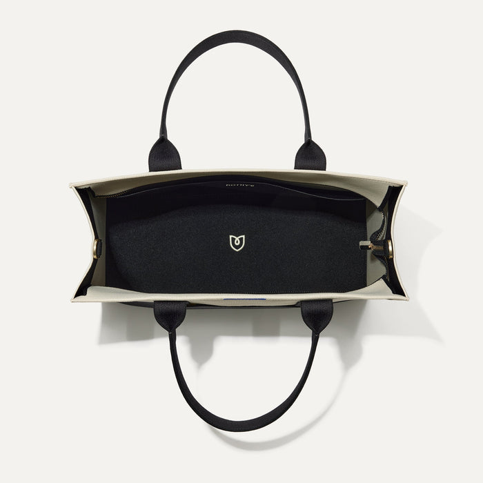 The Classic Tote in Luna, shown from above, with the interior exposed.
