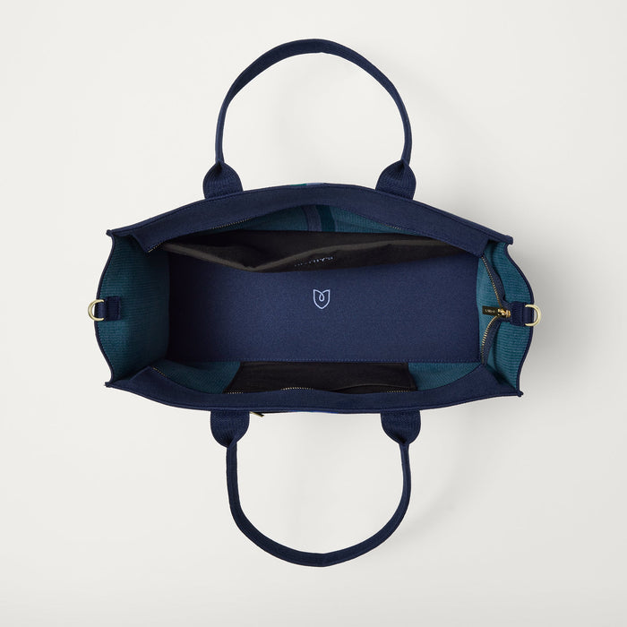 The Classic Tote in ReVelvet Peacock, shown from above, with the interior exposed.