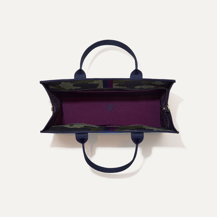The Classic Tote in Spruce Camo, shown from above, with the interior exposed.