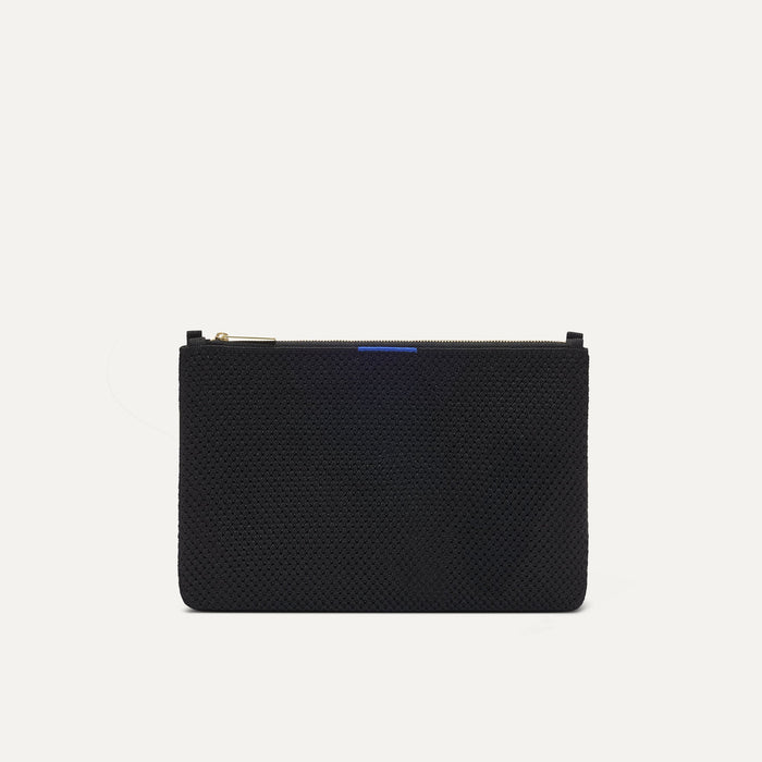 PLP |The Convertible Clutch in Black Espresso Open-Knit, shown from the front.