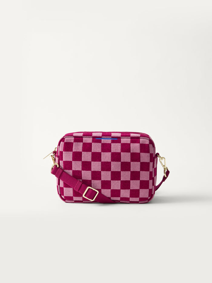 PLP | The Crossbody Camera Bag in  ReVelvet™ Orchid, shown from the front.