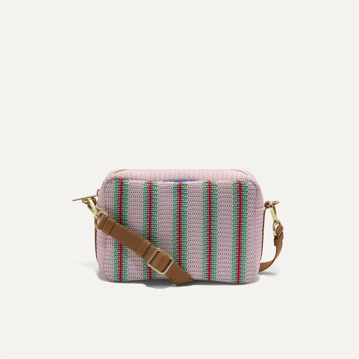 PLP |The Crossbody Camera Bag in  Watermelon Market Stripe, shown from the front.