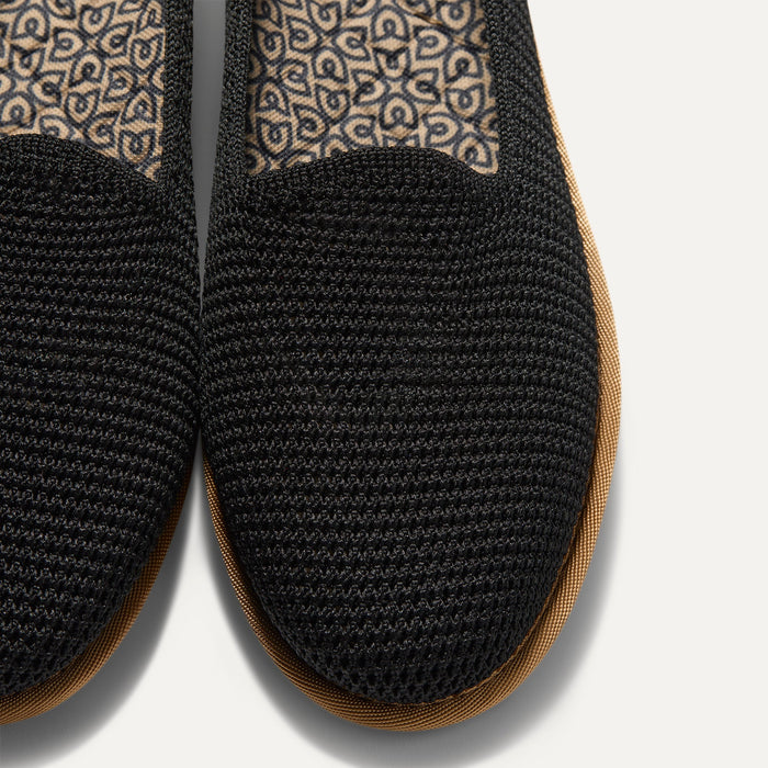 The toe and vamp of The Cruiser Loafer in Black Raffia-Knit.