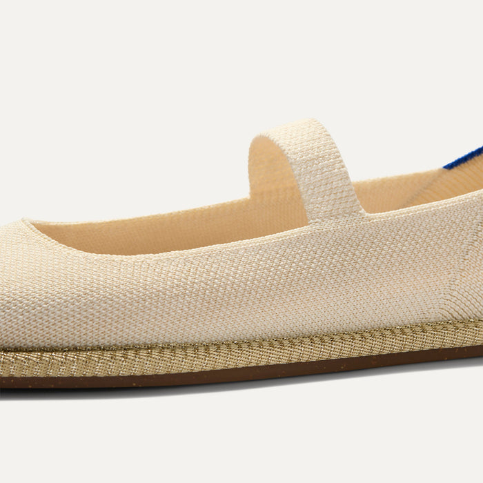 The vamp and top strap of The Cruiser Mary Jane in White Sand.