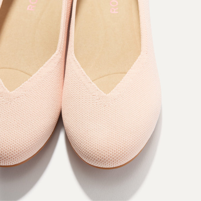 Close up of the toe and vamp of The Daily Flat in Bubbly Pink.