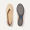 PLP |The Daily Flat in Ecru shown from the top with one shoe showing the outsole.