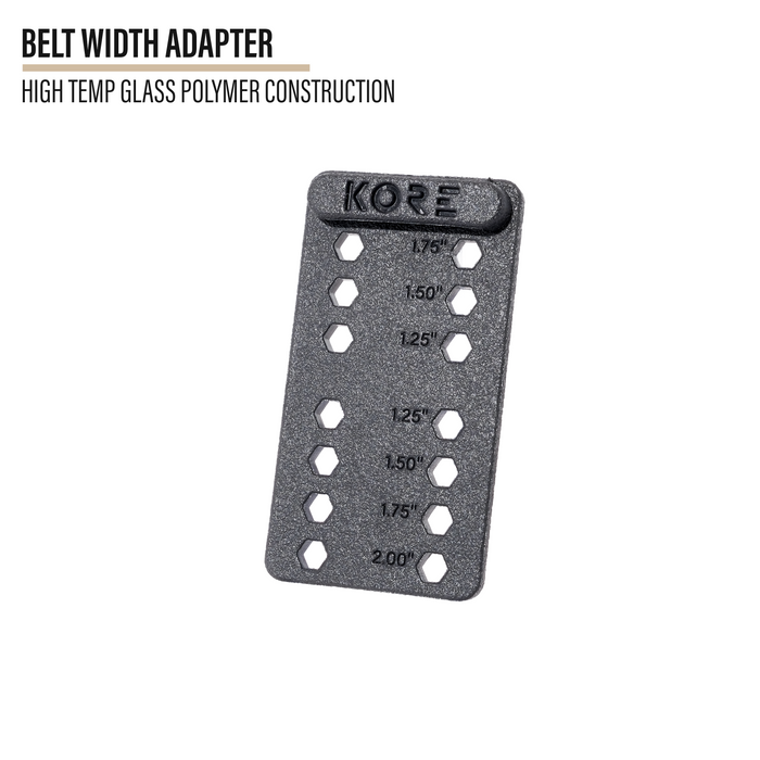 A black Kore Essentials belt width adapter tool made of high-temperature glass polymer, featuring pre-drilled holes and engraved measurements from 1.75 inches to 2.