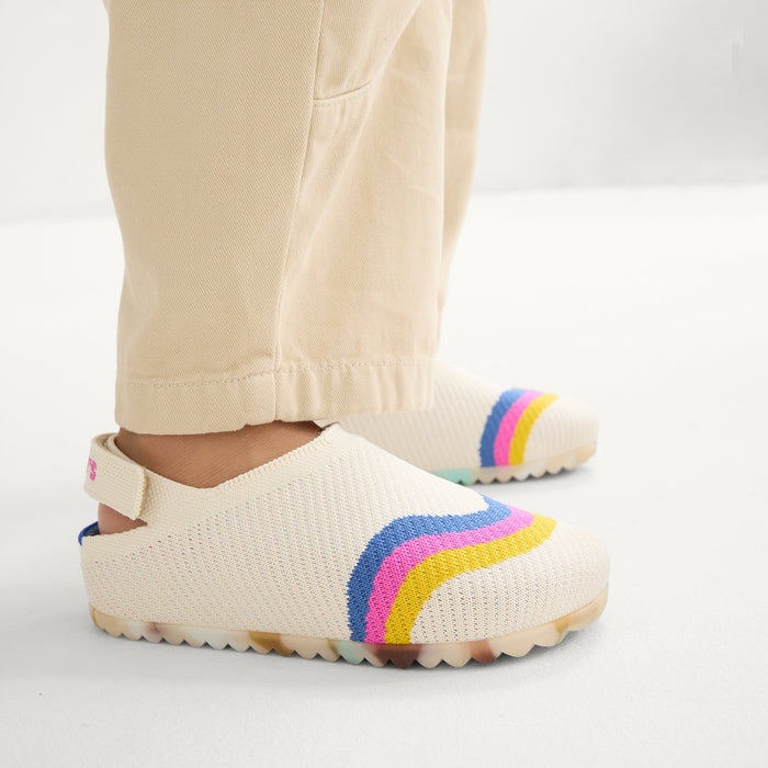 hover | A child wearing The Kids Clog in Retro Wave.