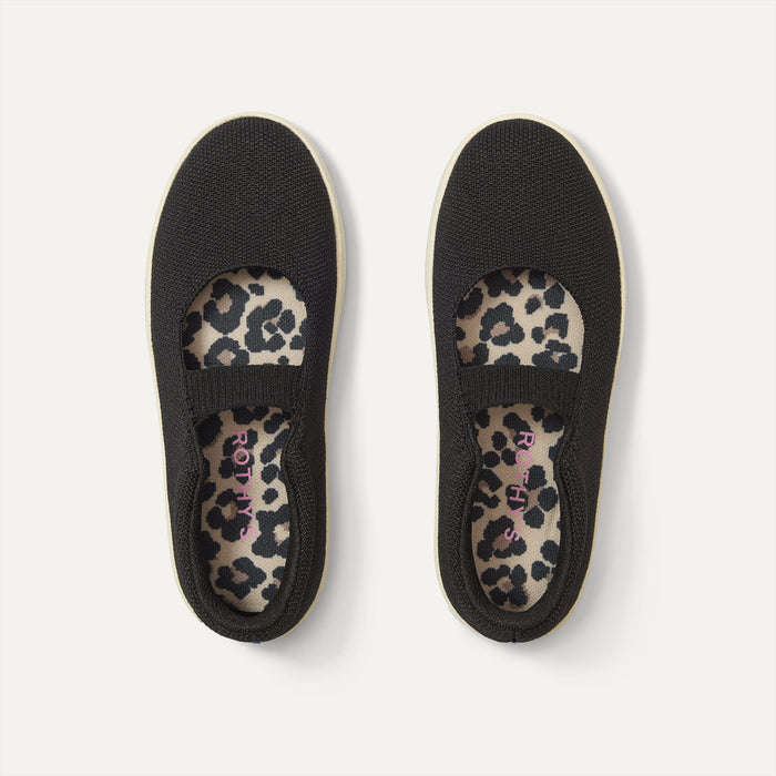 The Kids MJ Sneaker in Black shown from the top.