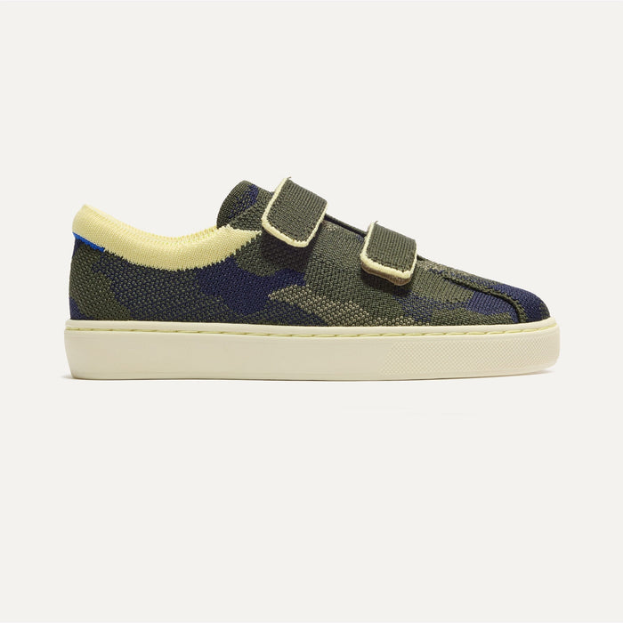 side | The Kids Strap Sneaker in Spruce Camo shown from the side.