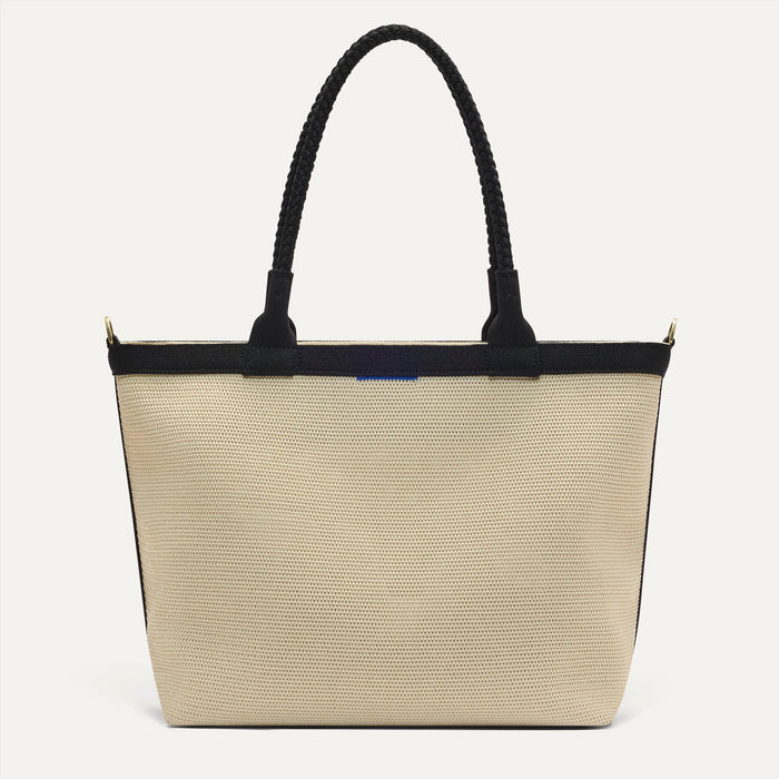 PLP |The Lightweight Zip Tote in Black and White Raffia-Knit shown from the front.