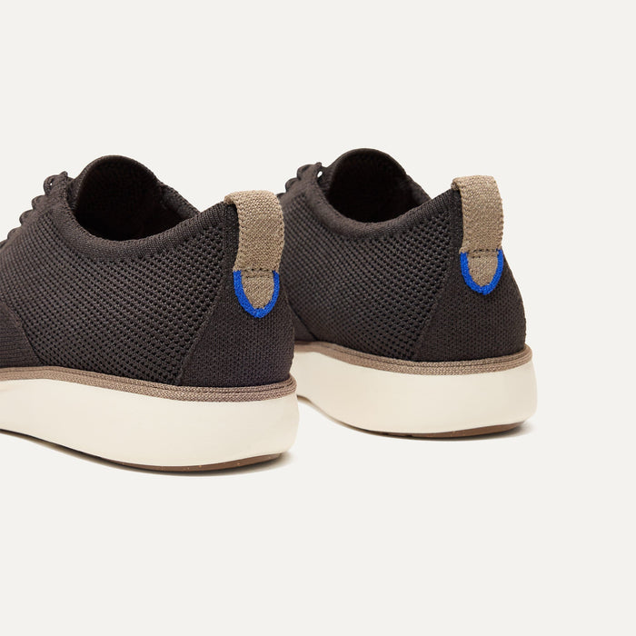 Close up of the heel of The Oxford in Deep Brown, with Rothy's signature blue halo.