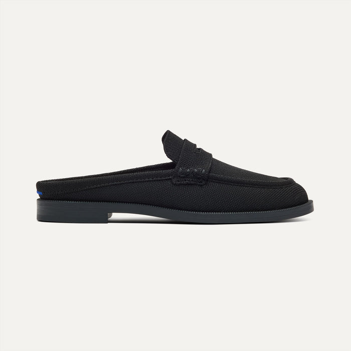 side | The Penny Loafer Mule in Black shown from the side.