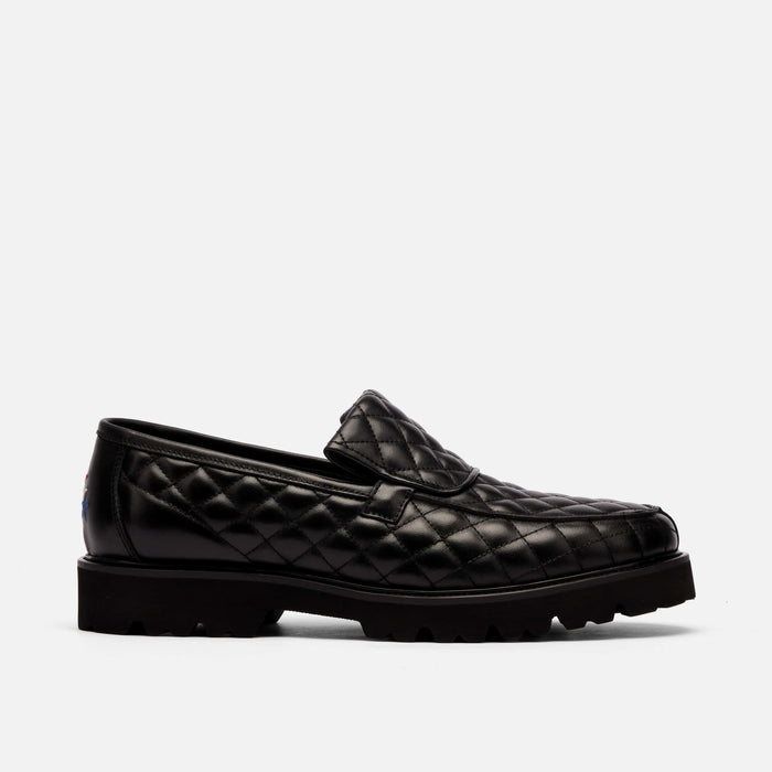 The Pitch Black Quilted Leather Lug Penny Loafers